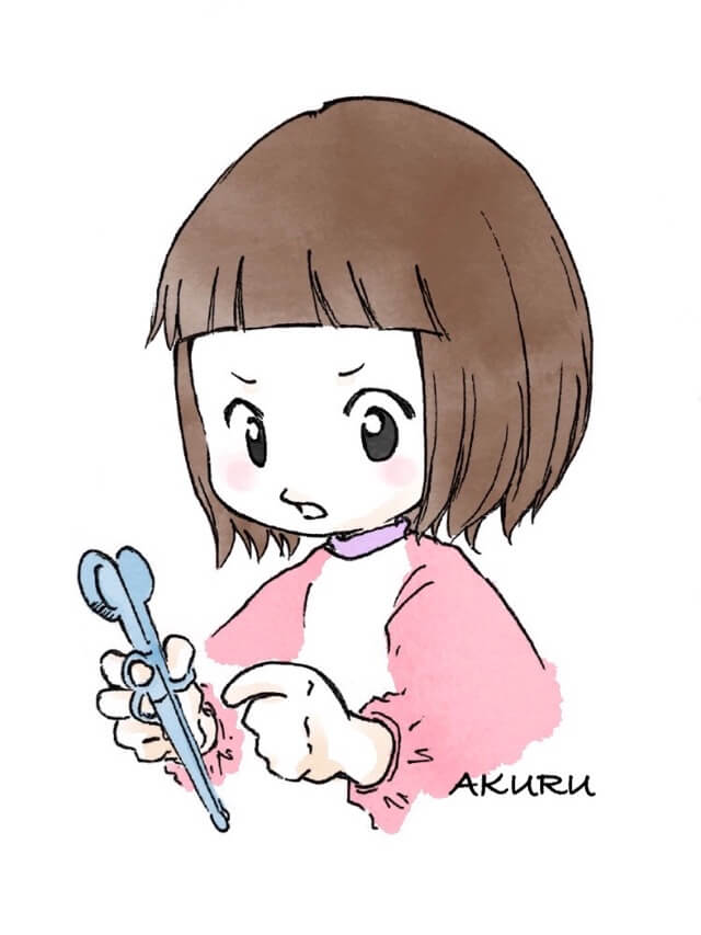お箸を持つ幼児のイラスト